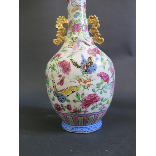 1165 - A 19th Century Chinese Famille Rose Porcelain Vase, 23.5cm. One handle glued