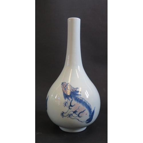 1168 - A Chinese Porcelain Vase decorated with Qilin and other mythical beast, 23cm tall
PHONE BID