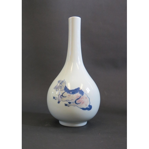 1168 - A Chinese Porcelain Vase decorated with Qilin and other mythical beast, 23cm tall
PHONE BID