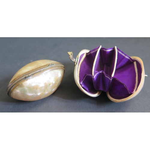 1196 - A 19th Century Mother of Pearl Hinged Shell Purse with purple silk lined interior (6cm) and one othe... 