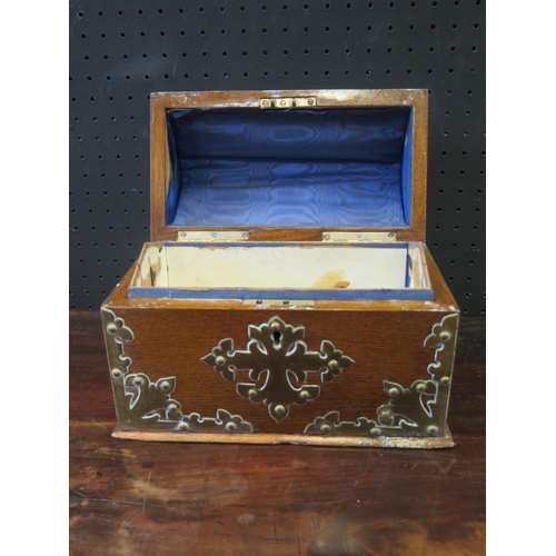 1331 - A Victorian Gothic Oak and Brass Mounted Dome Top Casket, 25cm wide