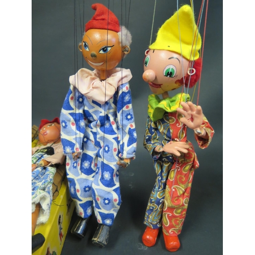 174 - Four Pelham Puppets, One with Flat Lead Hands. Comes with two incorrect boxes