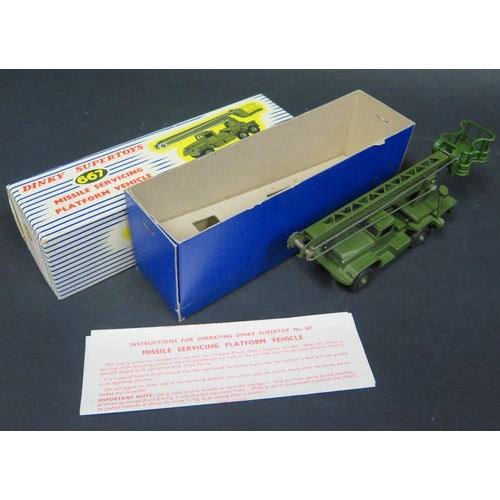 190 - A Dinky Toys No. 667 Missile Servicing Platform Vehicle. Near mint with excellent blue stripe box wi... 