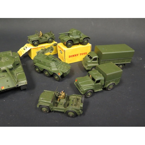 199 - Seven Dinky Toys Military Tanks, Trucks and Austin Champs.