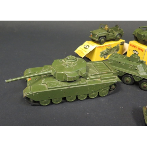 199 - Seven Dinky Toys Military Tanks, Trucks and Austin Champs.