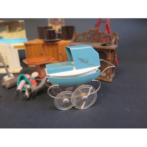 315a - A Selection of Dolls House Furniture and accessories including Tri-ang Spot-On Pram.