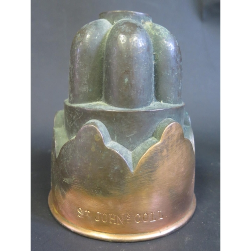 348 - A 19th Century Copper Jelly Mould by Trottier, stamped St. John's Coll., 15.5cm high