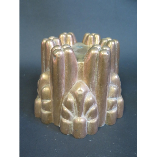 358 - A 19th Century Copper Jelly Mould, 18cm diam.
(PHONE BID IN 10)