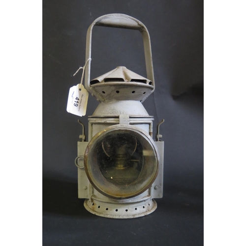 419 - A Grey Overpainted Railway Lamp with Wakefield 1945 plaque and stamped with crow's foot