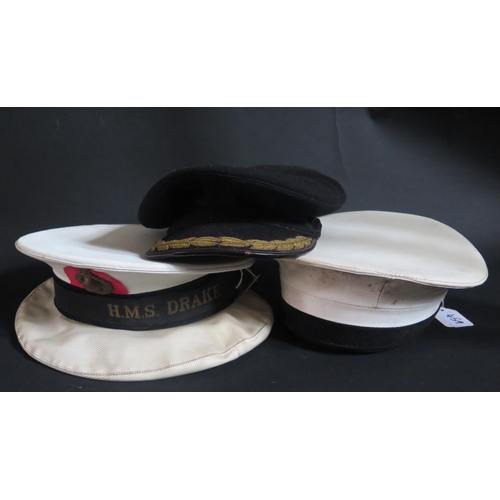 459 - A Royal Navy Cap with H.M.S. DRAKE Ribbon and two others