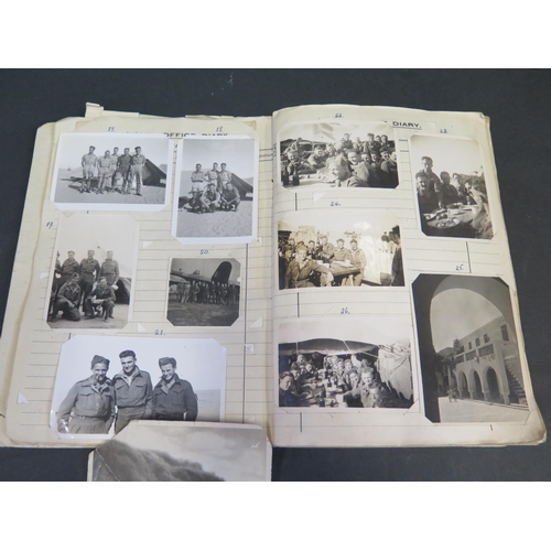 470 - A WWII Period Royal Airforce Signal Office Diary filled with photographs and postcards of North Afri... 