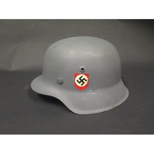 495 - A WWII German Helmet, repainted with SS decals, stamped 3453