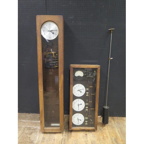 557 - A SYNCHRONOME Master Clock in a 127cm oak case, three dial control unit with 6