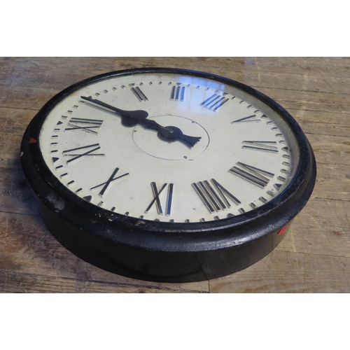 561 - A Heavy Cast Bronze Industrial Wall Clock with electric movement, the 17.5