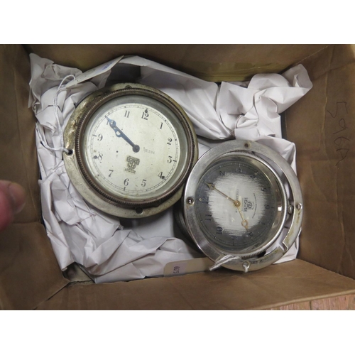 596A - A SMITHS Dashboard Clock with bezel wind (runs for about 10 seconds) and one other SMITHS (running)