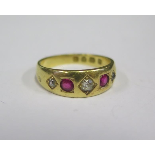 872 - A Victorian 18ct Gold, Ruby and Diamond Five Stone Ring, London 1883, JT, size K.5, 4g