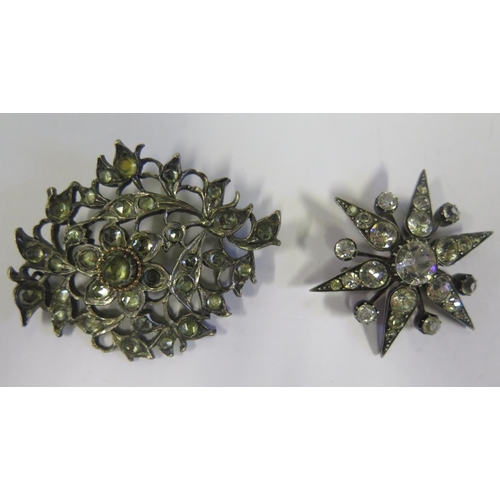 884 - A Georgian Floral Brooch set with rose cut paste, 51x40cm and silver and paste star brooch