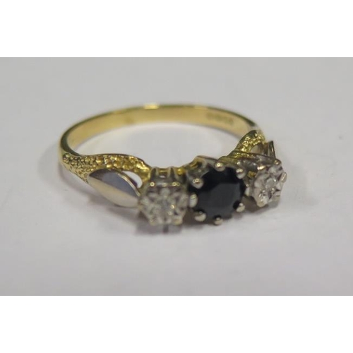 888 - An 18ct Gold, Sapphire and Diamond Three Stone Ring, size R, 3.8g