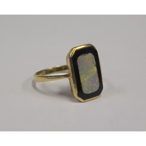 891 - An 18ct Gold, Opal and Black Onyx Ring, size N.5, 2.8g