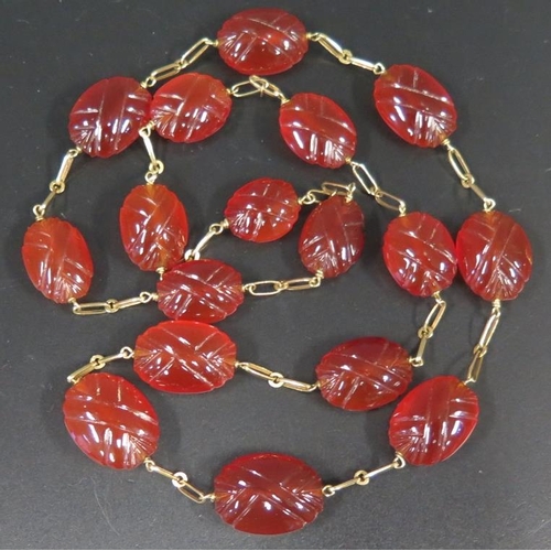 896 - A Carved Carnelian Necklace