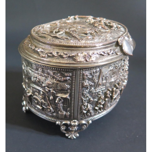 998 - A French Silvered Copper Hinged Oval Casket decorated in relief with drinking and hunting scenes, 14... 