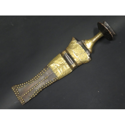 513 - An Antique West African Dagger with sheet brass and studded mounts, blade 33cm, probably Benin