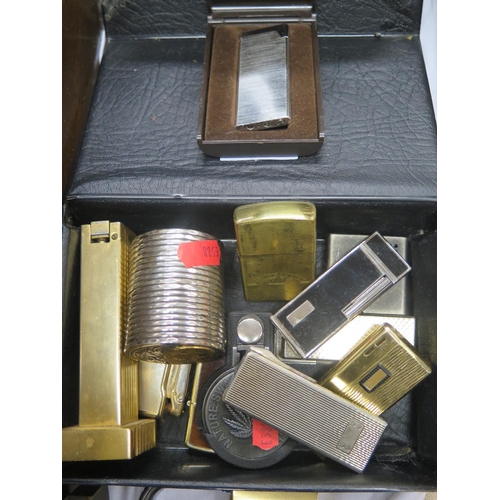 608 - A Collection of Lighters including RONSON table lighters, IC Calculighter etc.