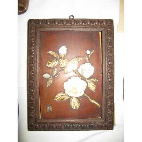 1145 - A Japanese Meiji Period Ivory and Mother of Pearl Plaque decorated with a blossoming branch and bird... 