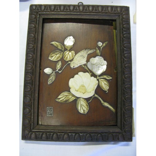 1145 - A Japanese Meiji Period Ivory and Mother of Pearl Plaque decorated with a blossoming branch and bird... 