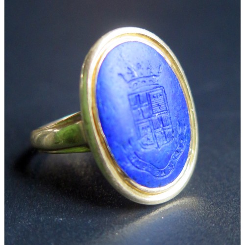 875 - A Georgian Period Lapis Lazuli Seal Ring in an unmarked gold setting, helix 18x13mm, size G, 5.8g