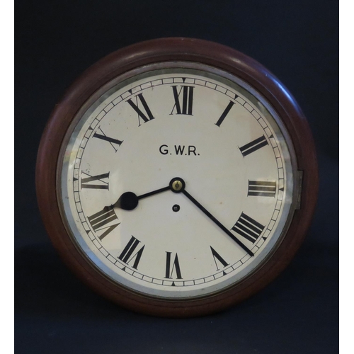 936 - A Twin Dial Railway Station Clock with dial marked G.W.R. a single chain driven fusee movement and 1... 