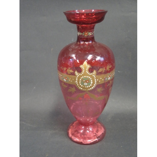 1633 - A Victorian Cranberry Glass Vase and collection of glass and ceramic candlesticks