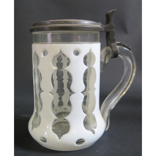 1129b - A 19th Century Bohemian Opaque and Slice Cut Glass Tankard with Porcelain Cover painted with a half ... 