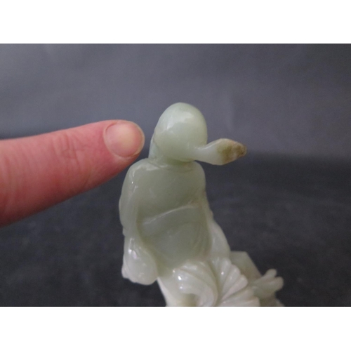 1016g - A Chinese Caved Jade Sage, 11.5cm tall. A/F