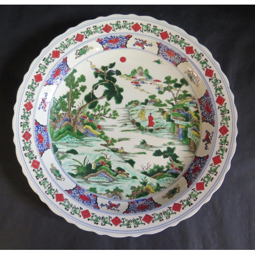 1017m - A Chinese Republican Period Porcelain Shallow Dish painted with figures in a landscape and with apoc... 