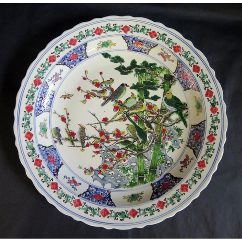 1017n - A Chinese Republican Period Porcelain Shallow Dish painted with prunus and birds and with apocryphal... 