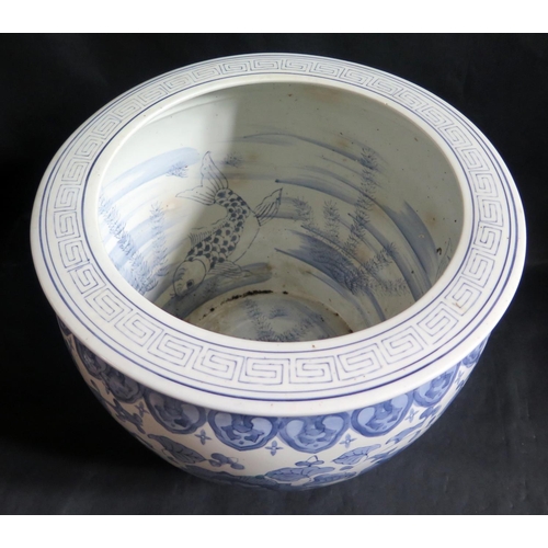 1017U - A Chinese Republican Period Blue and White Porcelain Goldfish bowl painted with foliate work and car... 