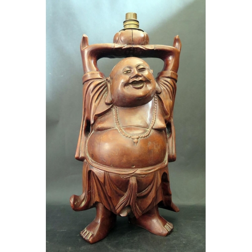 1017y - A Chinese Carved Hardwood Lamp in the form of a rotund laughing Budda, 43cm