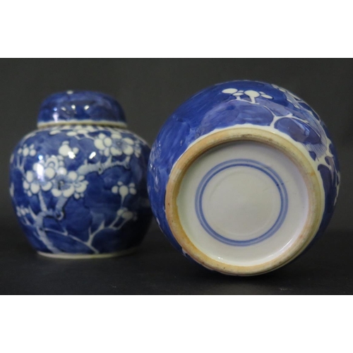 1027 - A Matched Pair of Chinese Blue and White Ginger Jars with prunus decoration, 10.5cm high