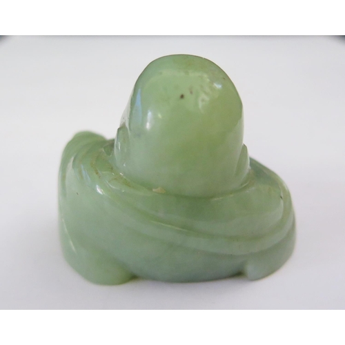 1049A - A Carved Jade Seated Buddha