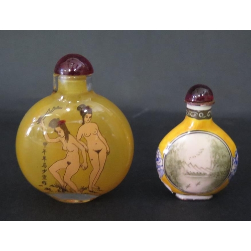 1051 - An Enamel Snuff Bottle decorated with nude and glass snuff