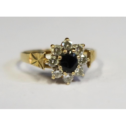 110 - A 9ct Gold, Sapphire and CZ Ring, size R, 2.1g