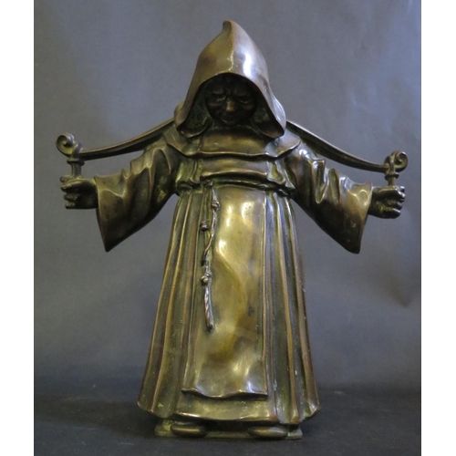 1196 - A Cast Bronze Monk bearing yolk, possibly originally a lamp, 24cm