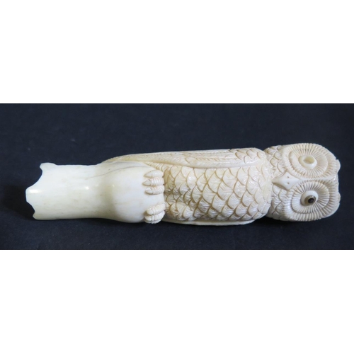 1208 - A 19th Century Carved Bone Owl Cane Finial with single inset eye, 12.5cm