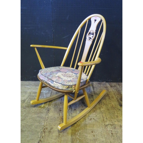 1242 - An Ercol Swan Back Rocking Chair, 91cm high