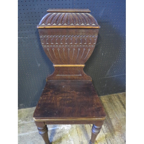 1265 - A Victorian Carved Oak Hall Chair