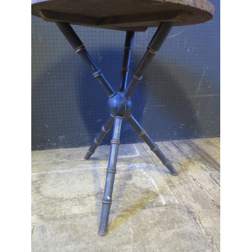 1283 - A Victorian Occasional Table with ebonised and gilt faux bamboo tripod base, 58cm diam.