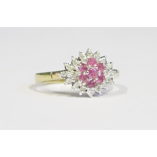 129 - A 9ct Gold, Ruby and Diamond Cluster Ring, size M.5, 2.7g