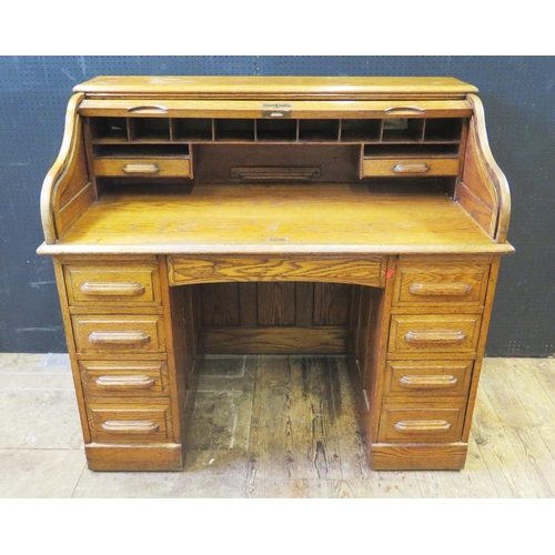 1312 - A 1930's Oak Roll Top Desk with key, 122(w)x110(h)x66(d)cm