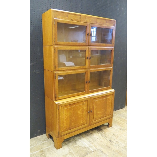 1398 - A Minty Art Deco Style Oak Four Tier Sectional Bookcase with cupboard to base, 89(w)x143(h)x29(d)cm